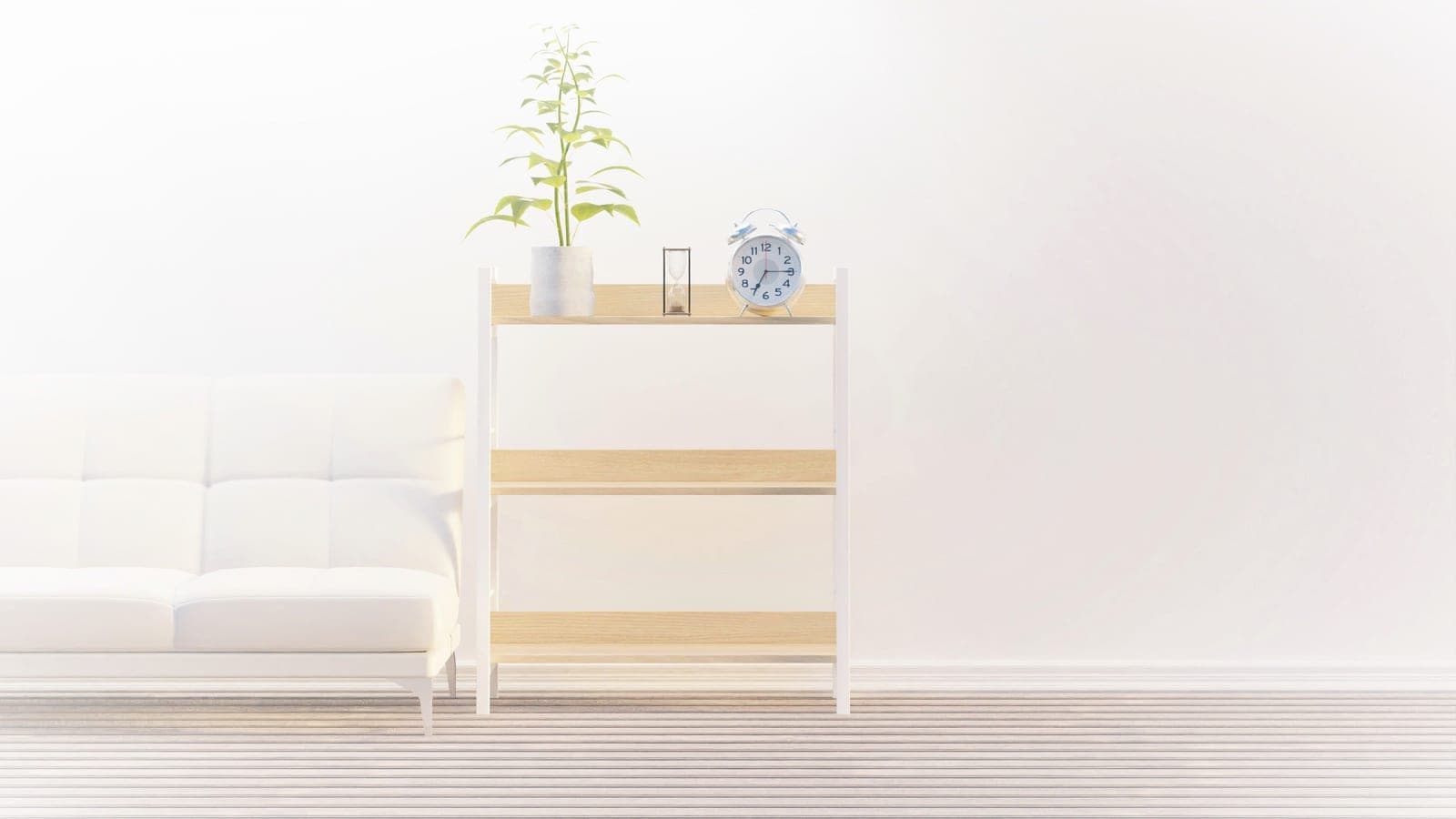 A bright shelf with green plants in a clean, simple room